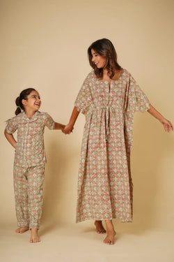 Green print unisex nightsuit for kids - Set of two