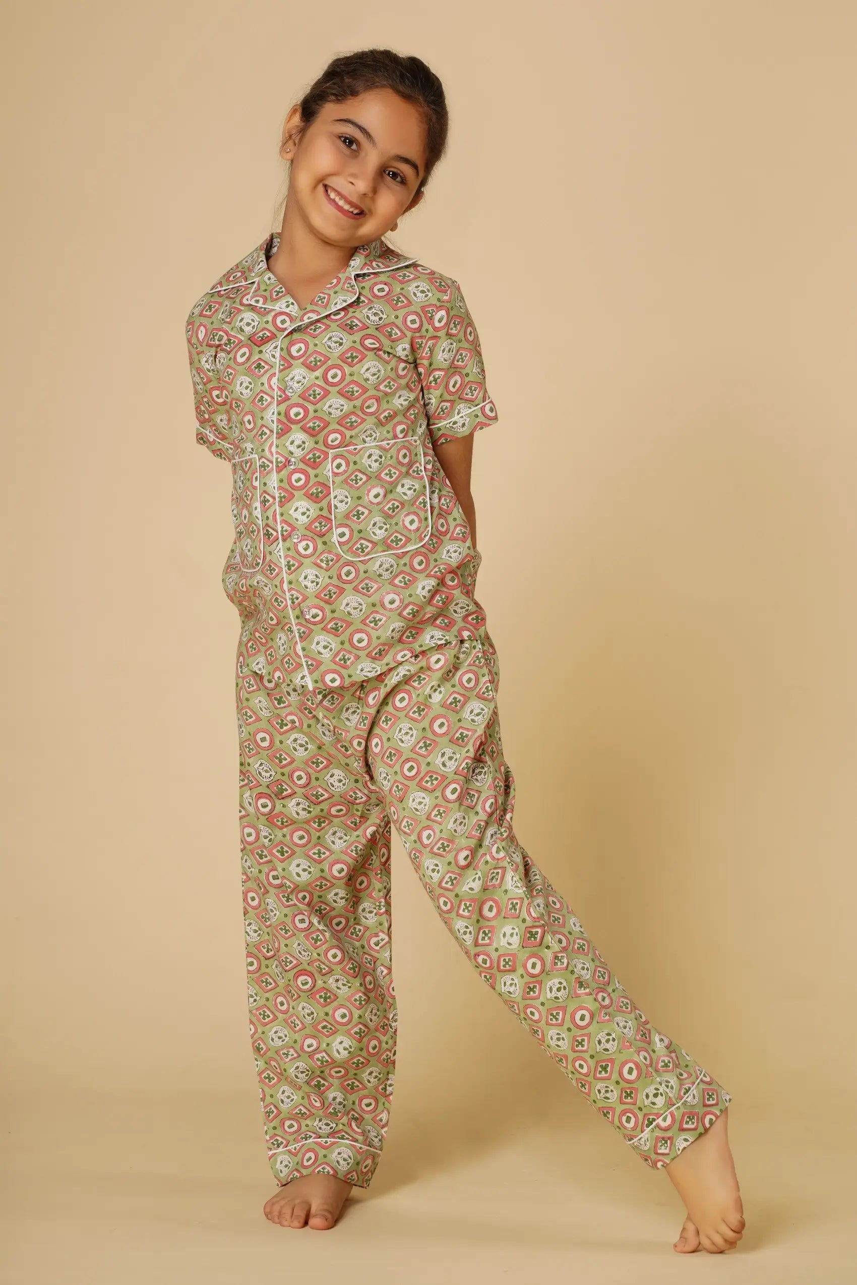 Green print unisex nightsuit for kids - Set of two